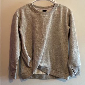 Grey women’s workout crew neck pullover, size large fits like a small never worn